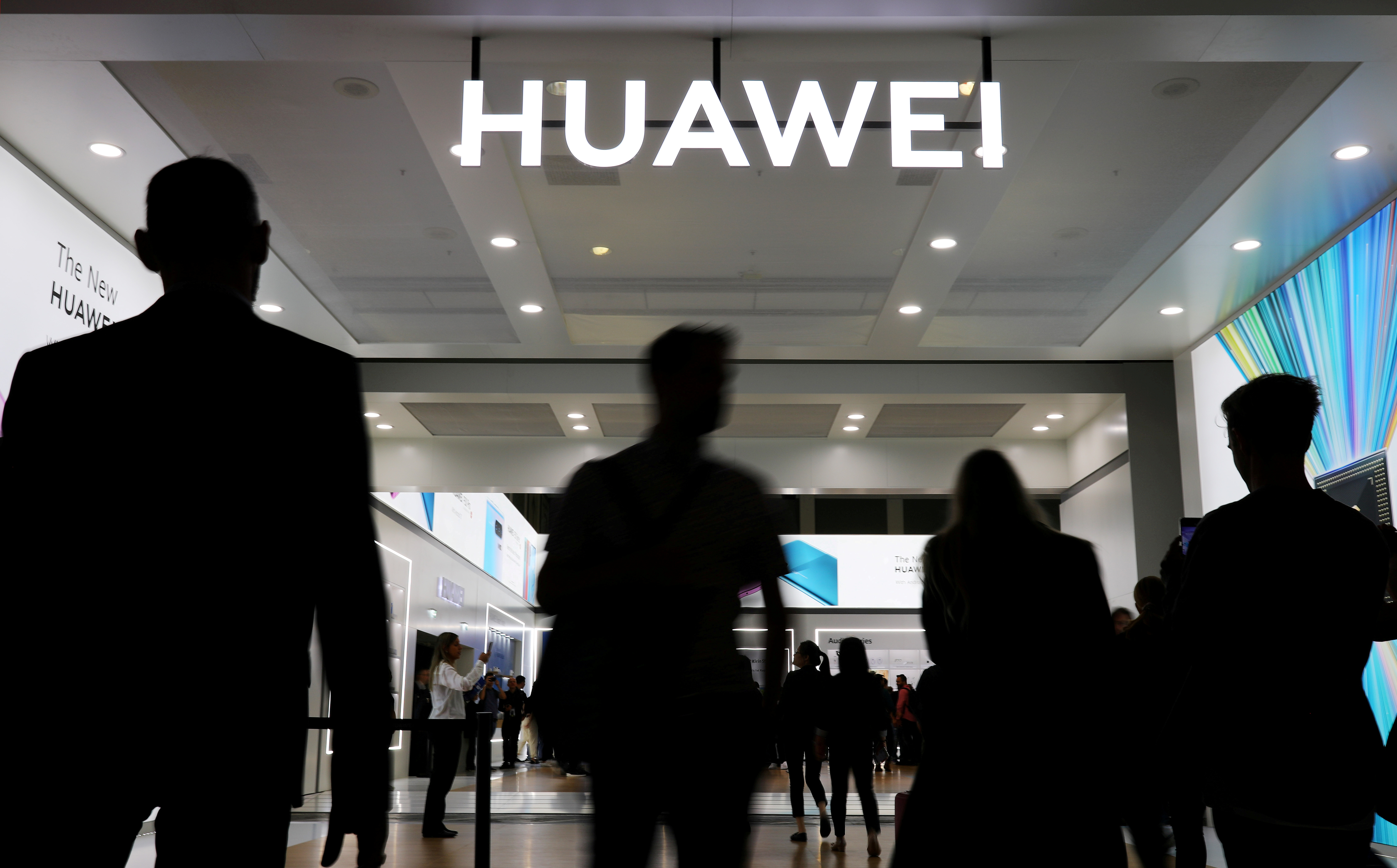FILE PHOTO: The Huawei logo is pictured at the IFA consumer tech fair in Berlin, Germany, September 6, 2019. REUTERS/Hannibal Hanschke/File Photo