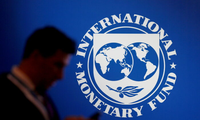 IMF: Đẩy nhanh việc cắt giảm chương trình mua tài sản và thắt chặt chính sách tiền tệ