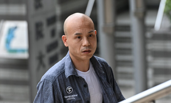 Kẻ côn đồ thân ĐCSTQ Hồ Ái Dân (Hu Aimin) bị kết án về hai cáo buộc hình sự và bị kết án 15 tuần tù. (Ảnh: Sung Pi-Lung/The Epoch Times)