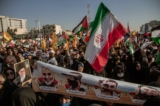 Những người ủng hộ chính phủ Iran đang tham gia một cuộc biểu tình chống Israel trên phố Enghelab để bày tỏ sự ủng hộ của họ đối với người Palestine, ở Iran, hôm 18/10/2023. (Ảnh: Hossein Beris/Middle East Images/AFP qua Getty Images)