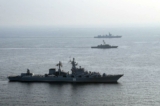 Các chiến hạm của Nga, Trung Quốc, và Iran trong cuộc tập trận quân sự chung ở Ấn Độ Dương vào ngày 21/01/2022. (Ảnh: Văn phòng Quân đội Iran/AFP qua Getty Images)