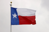 Toàn cảnh lá cờ tiểu bang Texas trong một sự kiện ở San Antonio, Texas, vào ngày 30/03/2023. (Ảnh: Mike Mulholland/Getty Images)