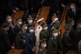 Các đại biểu quân sự Trung Quốc rời phiên bế mạc Đại hội Toàn quốc lần thứ 20 của Đảng Cộng sản Trung Quốc tại Đại lễ đường Nhân dân ở Bắc Kinh, vào ngày 22/10/2022. (Ảnh: Kevin Frayer/Getty Images)