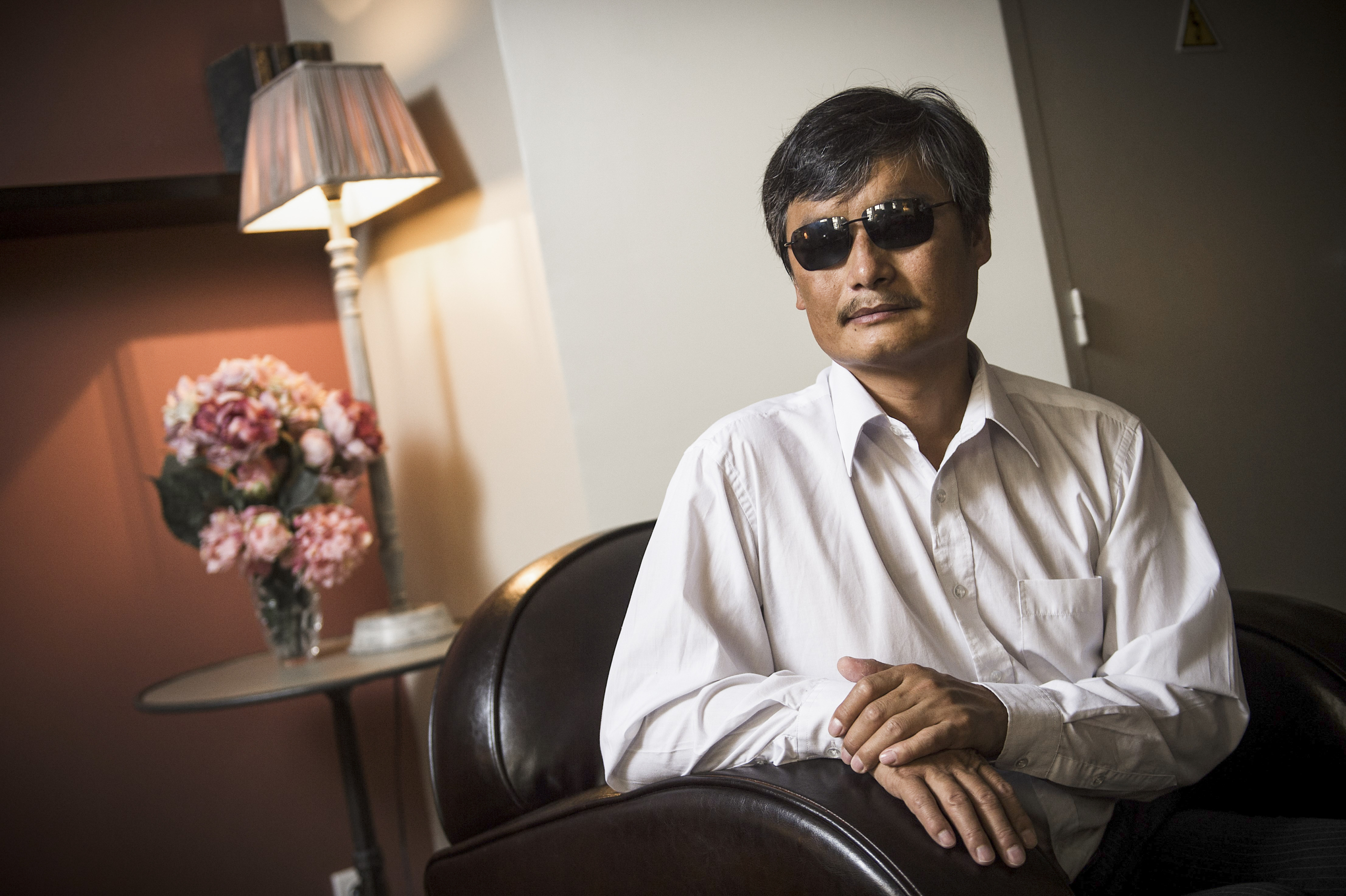 Ông Trần Quang Thành, một luật sư tự học, ủng hộ người nghèo ở Trung Quốc. (Ảnh: Lionel Bonaventure/AFP qua Getty Images)