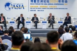 Các ký giả tham dự một sự kiện trong khuôn khổ Hội nghị Thường niên năm 2024 của Diễn đàn Bác Ngao Châu Á (BFA) tại Bác Ngao, tỉnh Hải Nam, miền nam Trung Quốc hôm 26/03/2024. (Ảnh: AFP/China OUT)